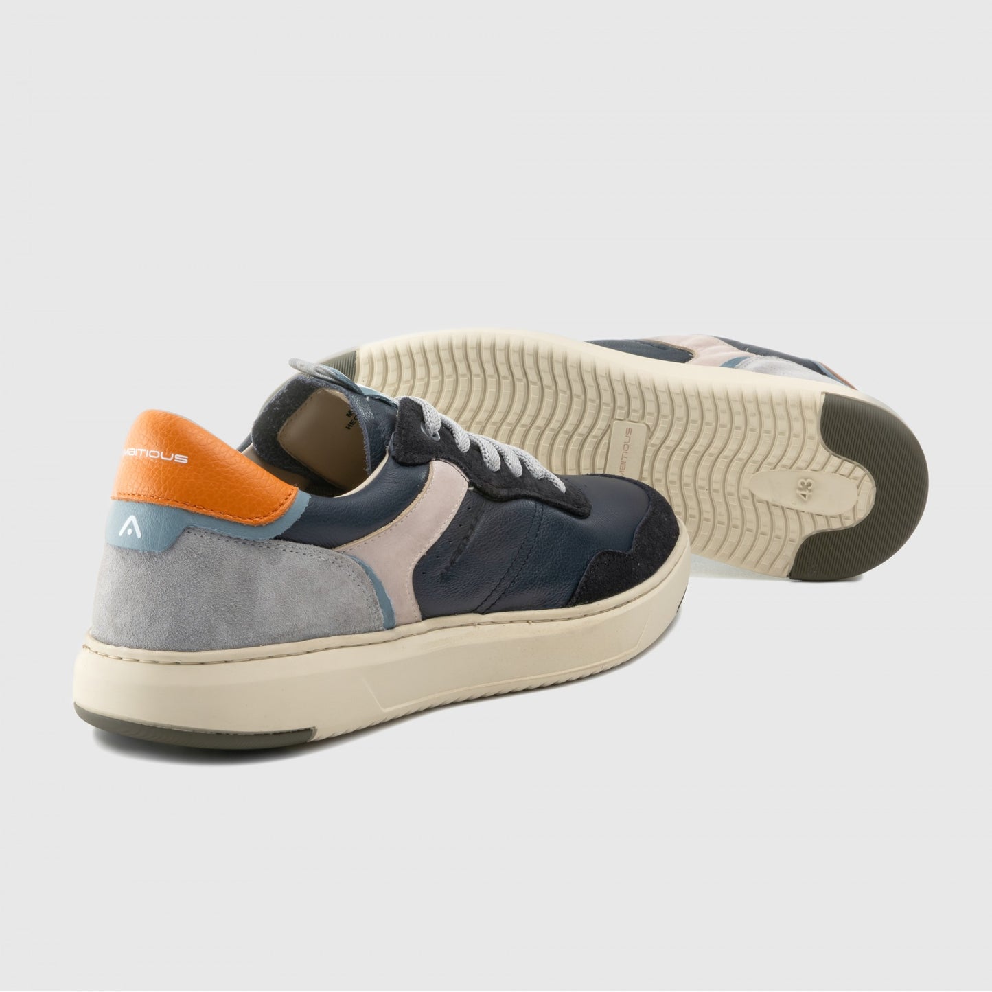NAVY TRAINERS WITH GREY AND ORANGE DESIGN