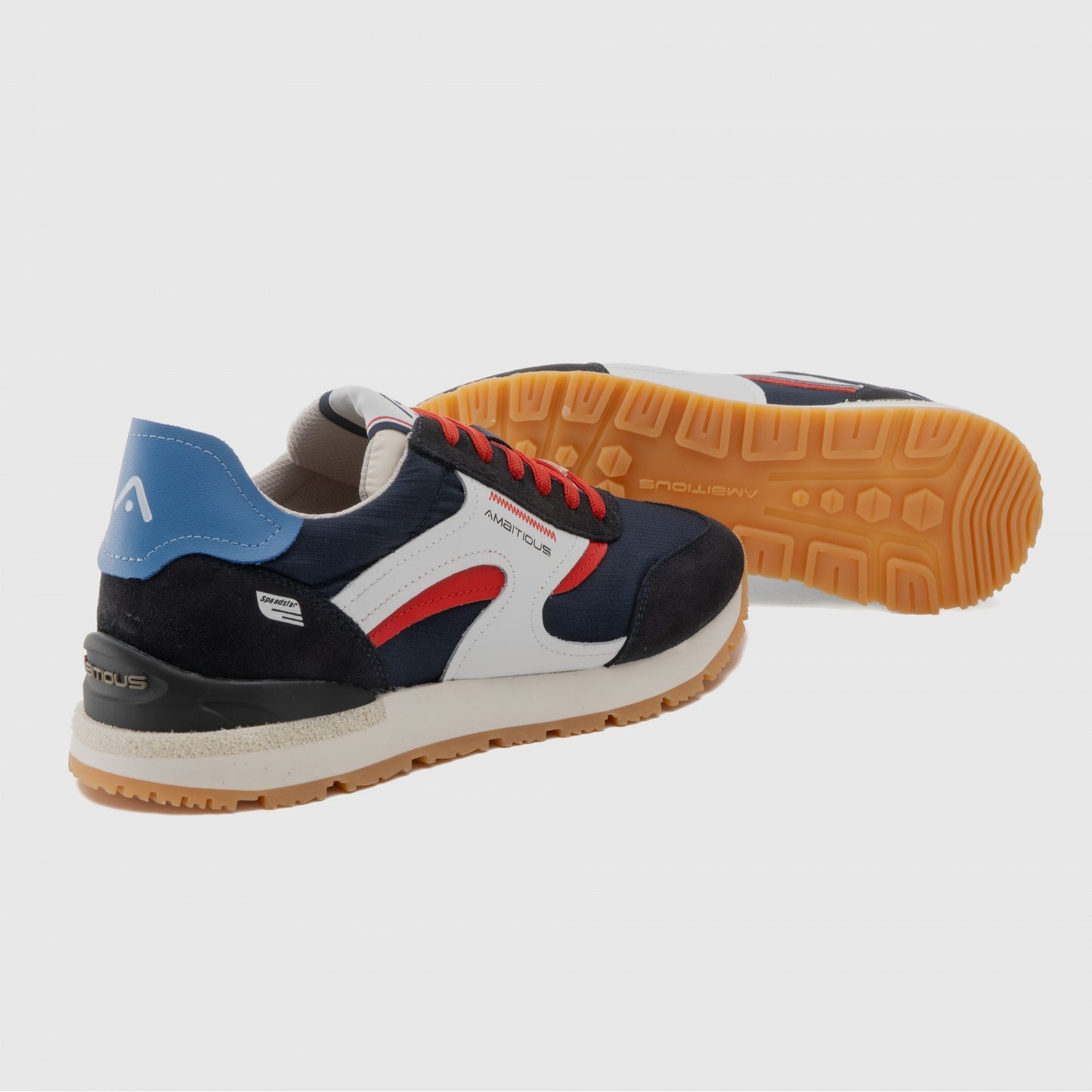 NAVY TRAINERS WITH WHITE AND RED DESIGN