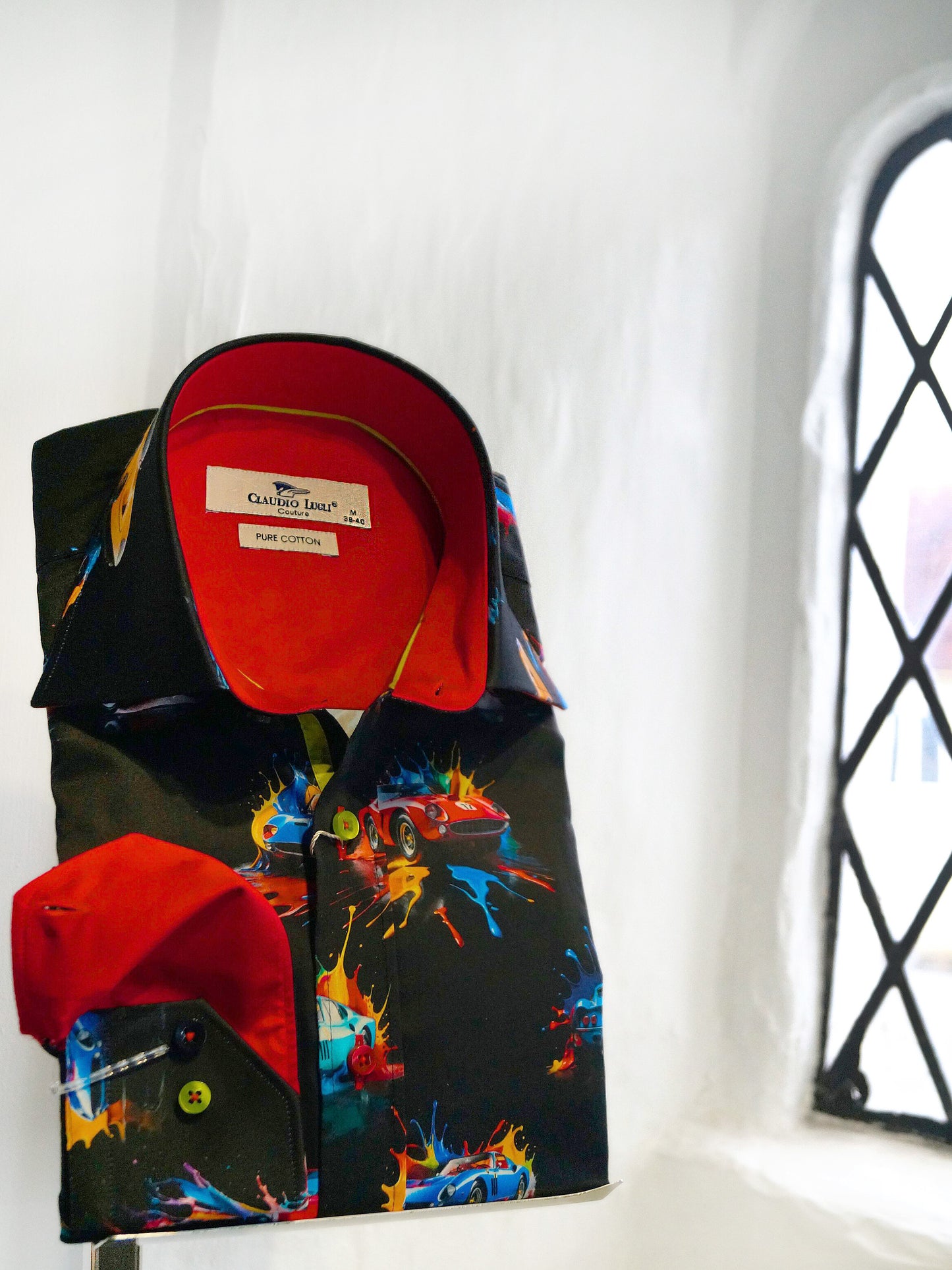 A men's long-sleeve shirt by Claudio Lugli featuring a black base with a colourful paint splatter and sports car print