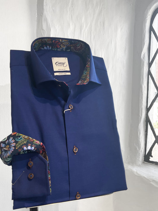 DARK BLUE PLAIN LONG SLEEVE SHIRT WITH NAVY PAISLEY INSERT AND BROWN BUTTONS