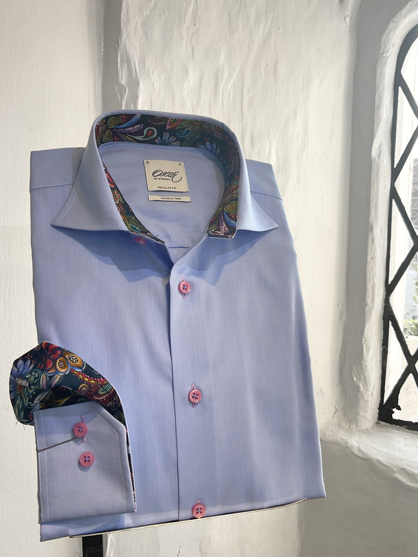 LIGHT BLUE PLAIN LONG SLEEVE SHIRT WITH NAVY PAISLEY INSERT AND PINK BUTTONS